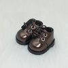 A pair of brown faux leather casual sneakers designed for 17cm Labubu dolls.