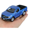 A blue Ford F-150 SVT Raptor 1:36 diecast model truck being held in a hand.