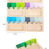 Wooden color matching toy featuring blocks of various colors arranged in a tray.