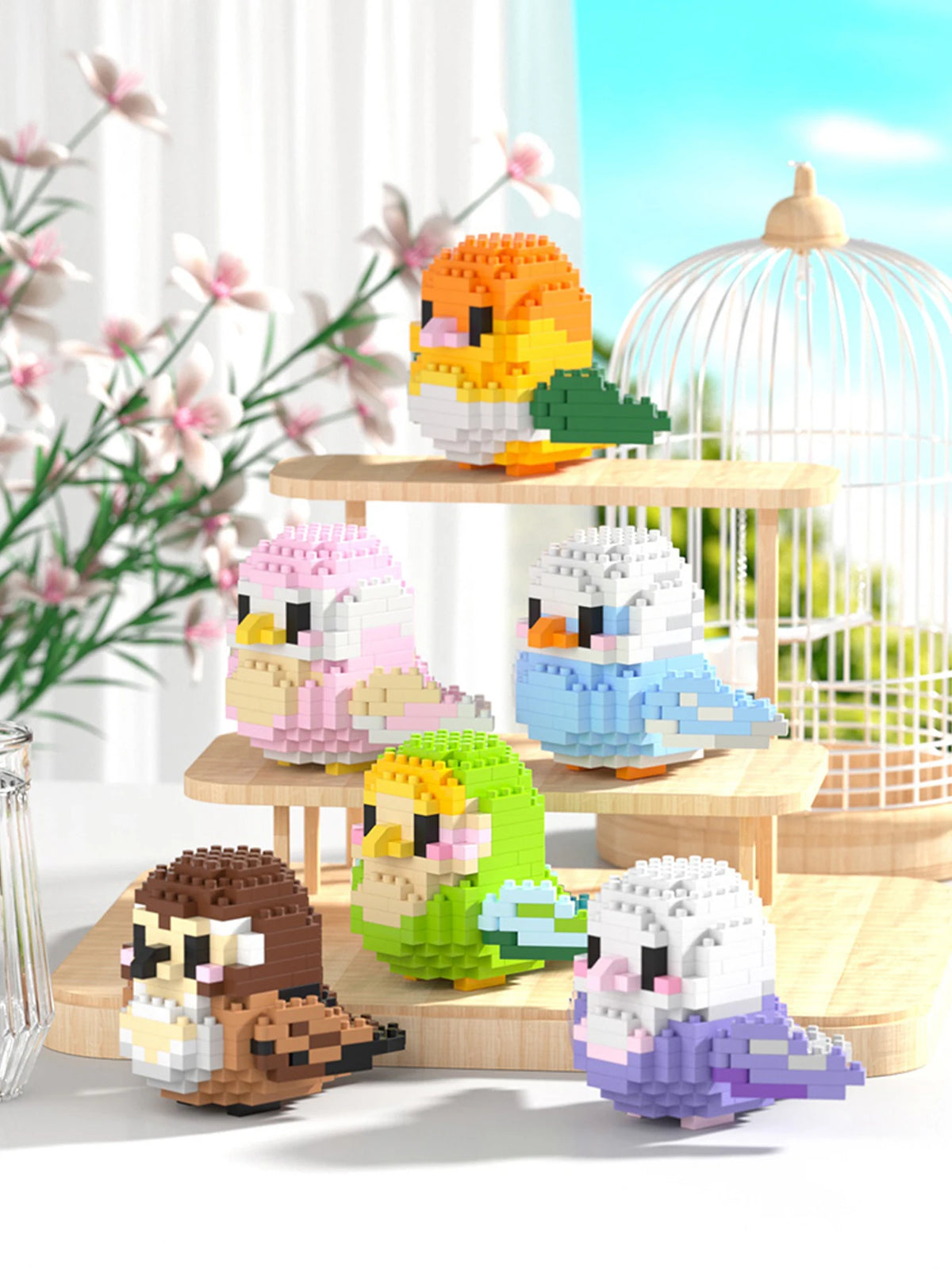 A set of colorful parrot micro building blocks featuring various bird figures in orange, pink, blue, and green.