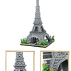 A miniature model of the Eiffel Tower built from gray LEGO-style blocks on a black base.