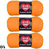Three balls of bright orange Super Soft yarn labeled GVD YARN for crochet and knitting