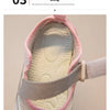 Close-up view of the interior lining and sole of a girls' casual slip-on shoe with a light pink upper.