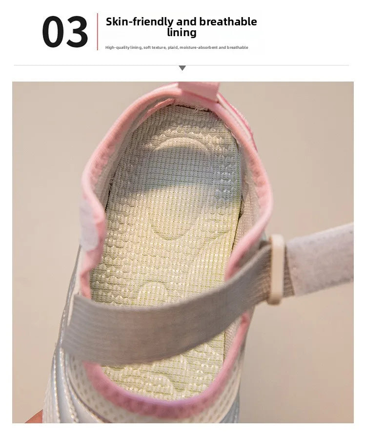 Close-up view of the interior lining and sole of a girls' casual slip-on shoe with a light pink upper.