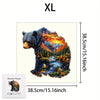 An XL wooden jigsaw puzzle depicting a bear in a forest landscape.