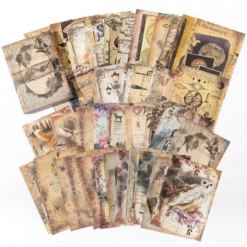A collection of vintage scrapbook paper sheets featuring botanical and antique illustrations for crafting.