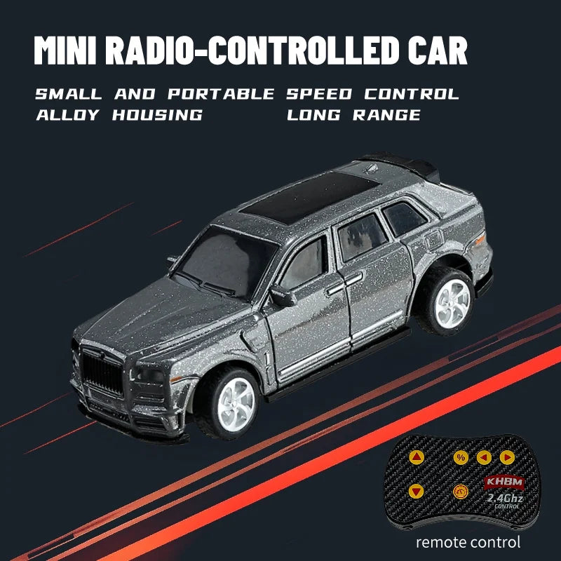 A black mini radio-controlled car with alloy housing is shown in a side profile against a dark background.