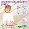 A young girl is playing with wooden jigsaw puzzles for early education skills like memory and concentration.