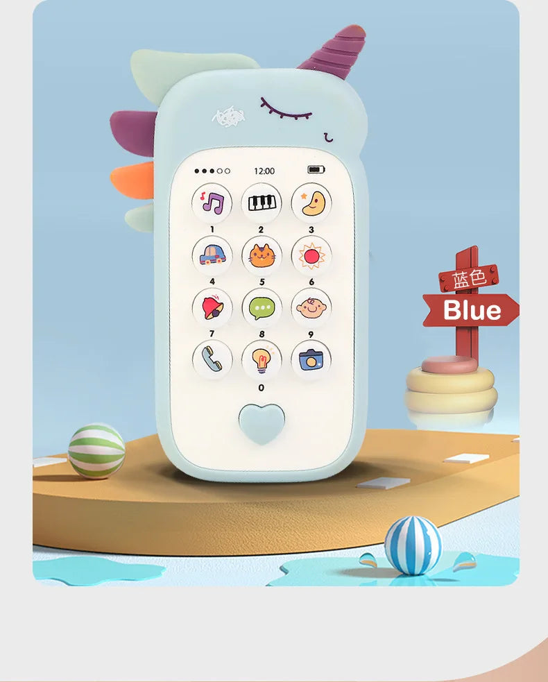 A light blue baby phone toy with a screen showing numbers and icons, resting on a wooden surface.