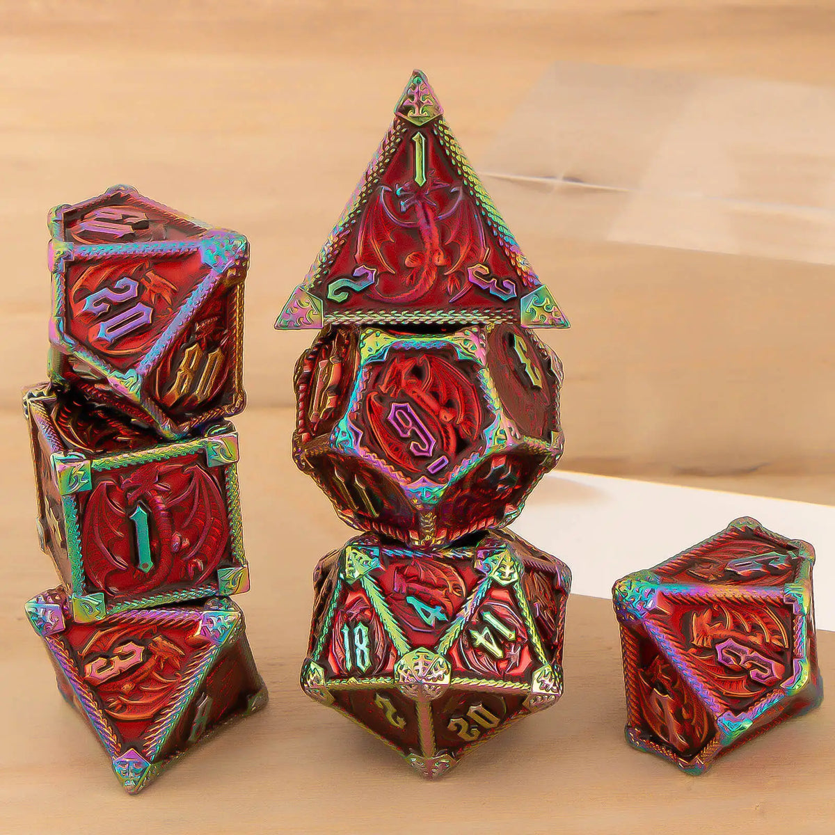 A set of seven premium metal polyhedral dice in various colors and shapes, including a d20 and dodecahedron.