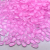 A pile of pink water drop Czech glass beads for jewelry making