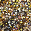 Multicolor round crystal glass beads used for jewelry making, featuring various shades of amber and clear glass.