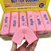 A box of pink butter squish toys with a squishy hand-shaped toy being held in a hand.