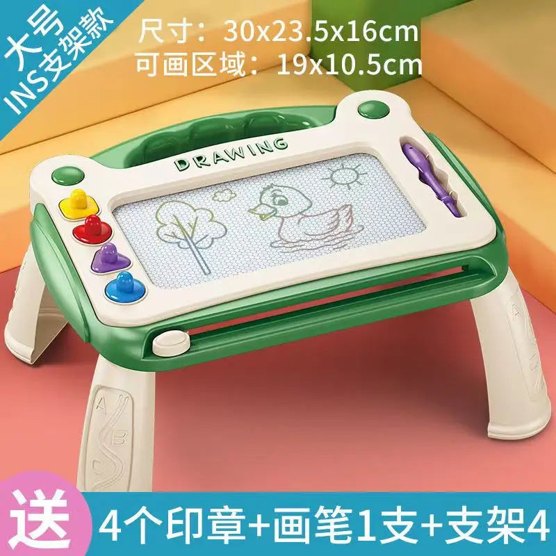 A green magnetic drawing board for kids featuring a white pad with a duck drawing and various colored markers.
