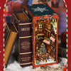 DIY wooden book nook kit featuring a Christmas street corner miniature model with a lighted display.