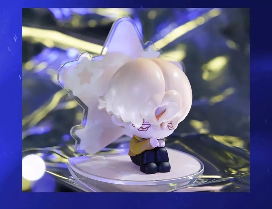 A cute, pale pink and white decorative figure with light purple accents is displayed on a clear stand.