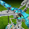 A detailed mechanical model of a dragonfly with two pairs of wings, featuring blue and silver components.
