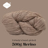 A ball of natural beige Merino wool yarn, approximately 300g, shown in a close-up.