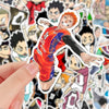 A hand holds an orange-haired anime character sticker from the Haikyuu sticker pack.