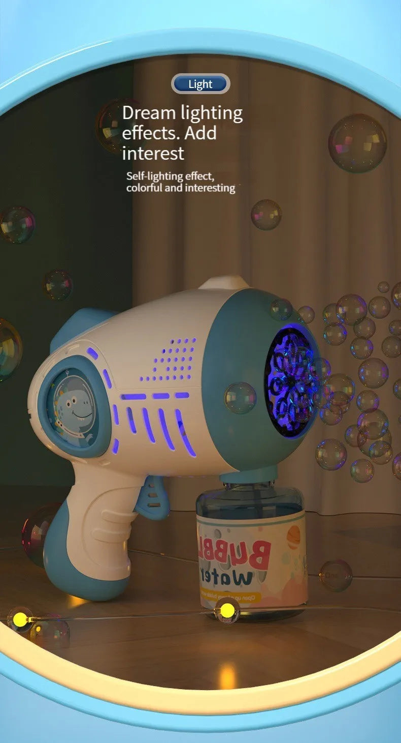 A white and teal automatic bubble machine with lights is shown on a wooden surface.
