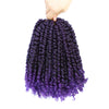A hand is holding a bundle of purple pre-looped passion twist crochet hair