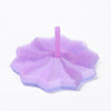 A translucent purple 3D illusion fidget star with radiating ridges and a central peg.