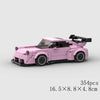 A pink classic rally car building block set shown from the side.