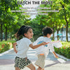 Two children play a multiplayer competition using foot launchers and flying discs with catching nets in a park setting.