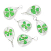 A set of five handmade glass four leaf clover pendants in green, displayed against a white background.