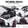 Close-up view of a white Nissan GTR model car showing engine details and features.