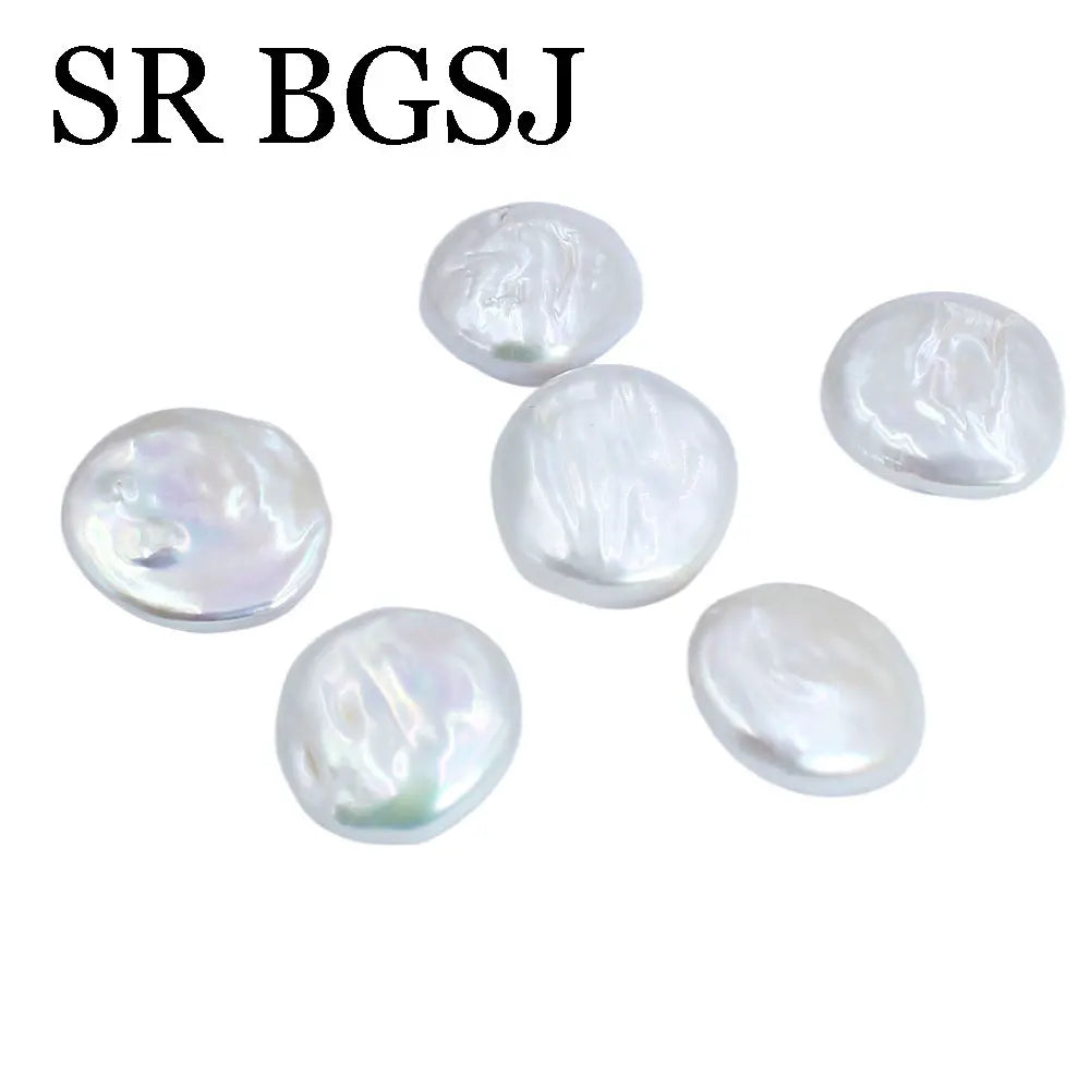 A collection of natural freshwater pearl beads for jewelry making, showing various sizes and lustrous surfaces.