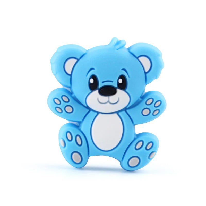 A light blue silicone cartoon bear bead with large ears and round features.