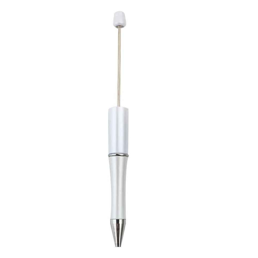 Silver ballpoint pen with a white cap and gold-colored tip.