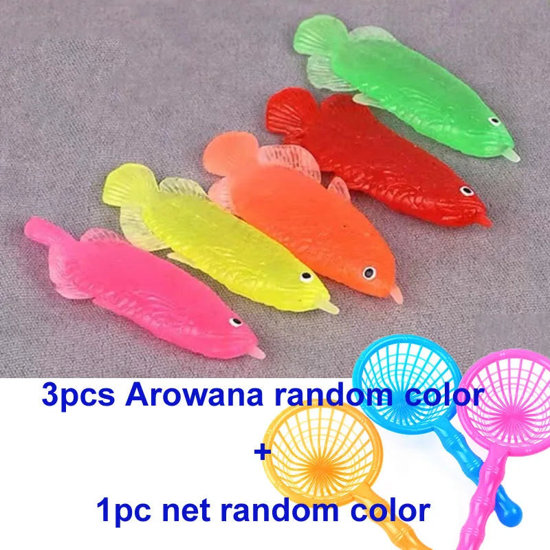 A set of 3 plastic arrowana goldfish bath toys in various colors plus 1 net random color