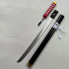 A long katana prop with a red checkered grip and a black sheath is displayed on a white background.