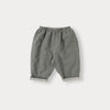 A pair of soft, gray knit sweater and pants for a toddler.
