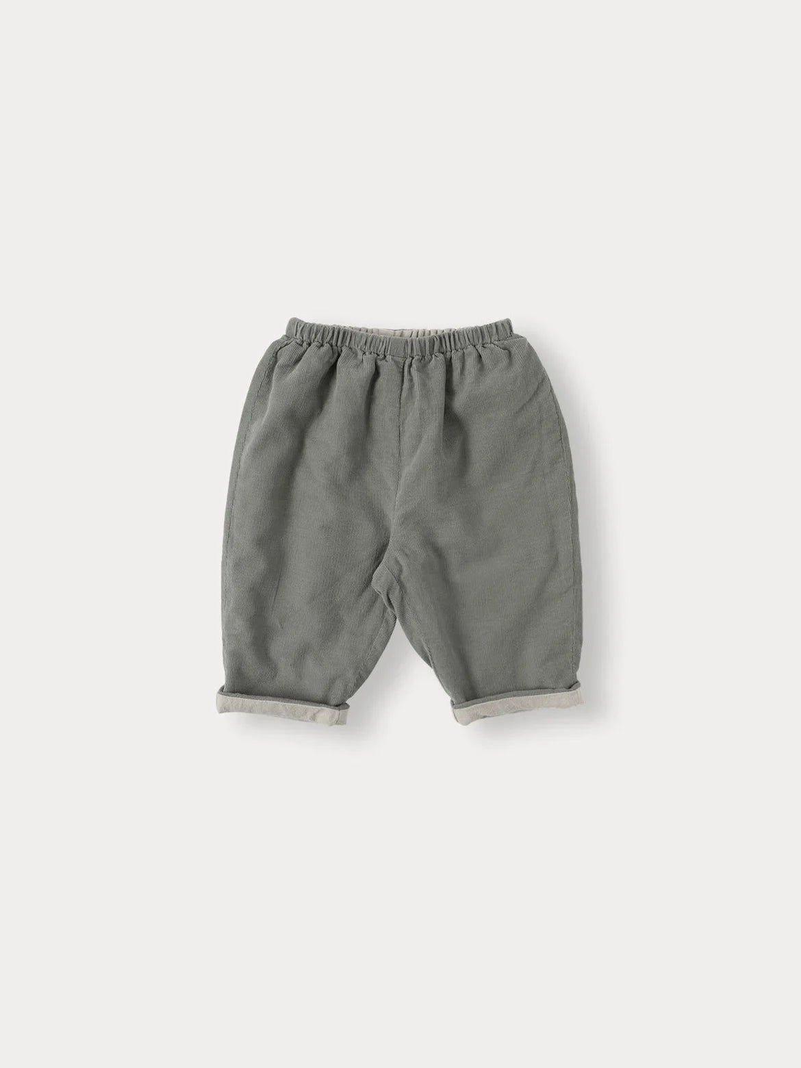 A pair of soft, gray knit sweater and pants for a toddler.