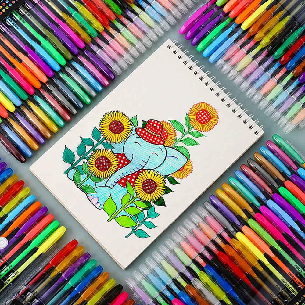 A collection of metallic glitter gel pens arranged on a white notebook page.