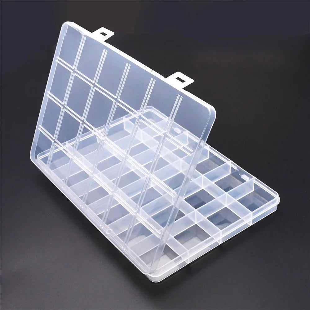Clear plastic storage box with dividers for organizing jewelry and craft supplies