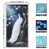 Diamond painting kit featuring a white peacock and magnolia on a dark blue background