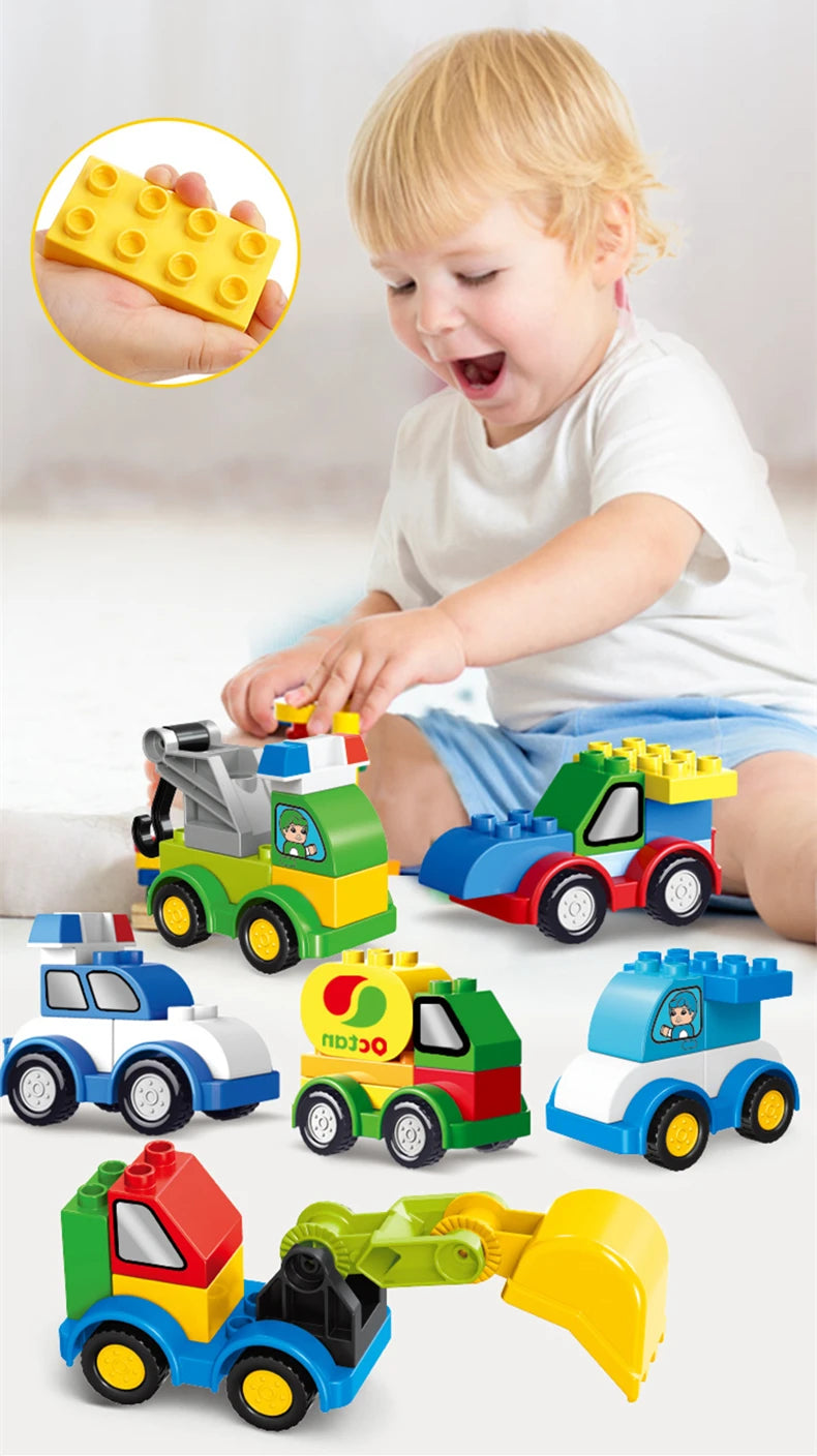 A young child is playing with a set of colorful construction vehicle building blocks, including trucks and machinery.