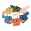 A collection of various colored denim jackets for 1/12 scale dolls, including olive green, tan, pink, and blue.
