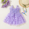 A purple princess-style butterfly suspender dress for baby girls with sheer fabric and floral accents.
