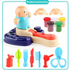 A set of color dough tools including a hair dryer, scissors, combs, and various shaping tools for kids
