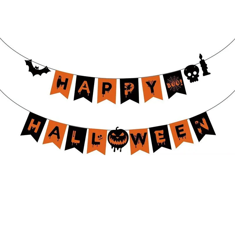 A Halloween paper flag banner featuring a witch, bat, and skull design in orange and black.