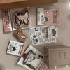 A collection of Hirono Monsters Carnival Series collectible figures and related packaging materials.