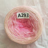 A spool of pink and white rainbow gradient mercerized cotton cake yarn labeled A293