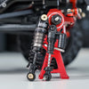 Close-up of red and black heavy-duty oil shocks for 1/24 RC crawlers
