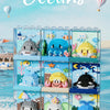 A set of clear building blocks featuring mini models of ocean animals like sharks, dolphins, and whales on a sandy background