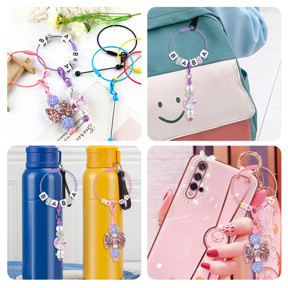 A collection of metal keychain bars with lobster clasps used for DIY jewelry making, featuring various colors and charms.